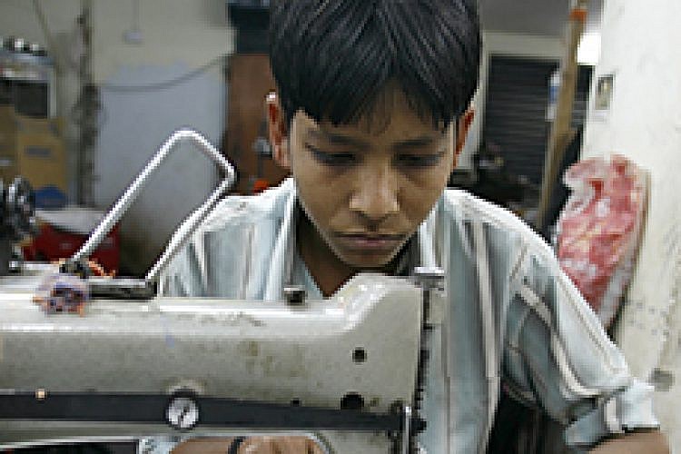 ילד עובד. צילום: Shutterstock