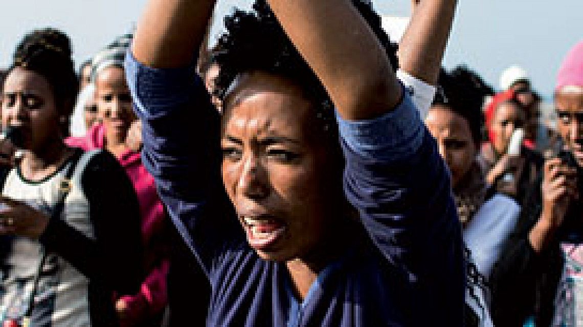 מהגרות מפגינות. צילום: Getty Images