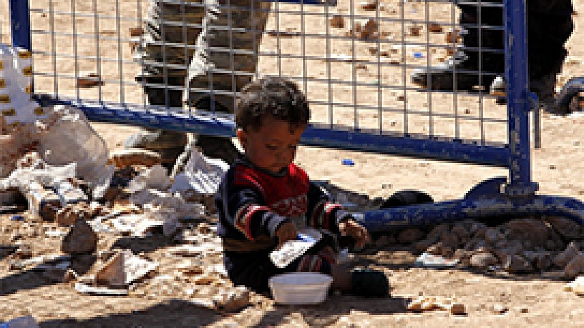 פליט סורי. צילום: Getty Images
