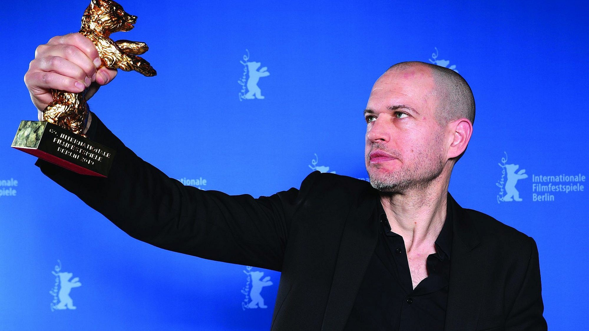 נדב לפיד זוכה בפסטיבל ברלין, פברואר 2019 (צילום: כריסטוף סודר\גטי אימג'ס)