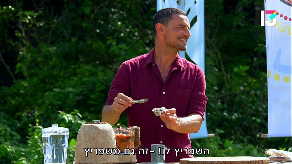 החיוך הכי נבזי שיש. גיא זוארץ, "הישרדות" (צילום מסך: רשת 13)