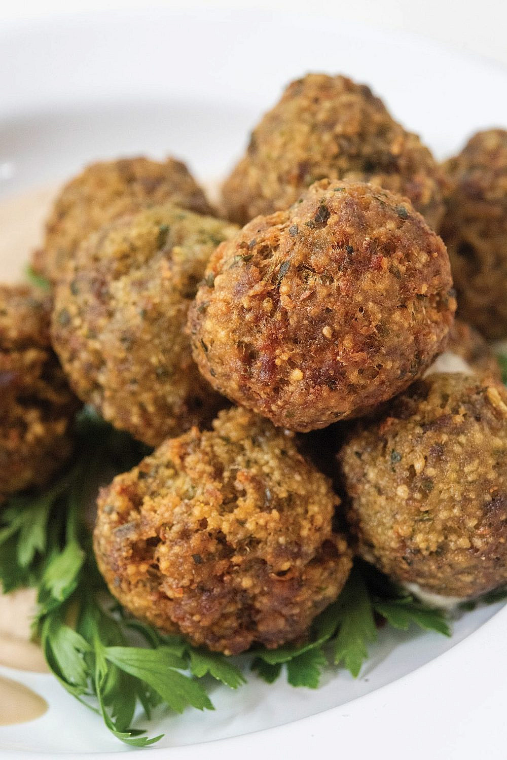 קובה נבלוסייה של אנוואר מתוך "יושבים אוכלים" (צילום מיכל רביבו)